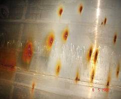 Pitting from defects.